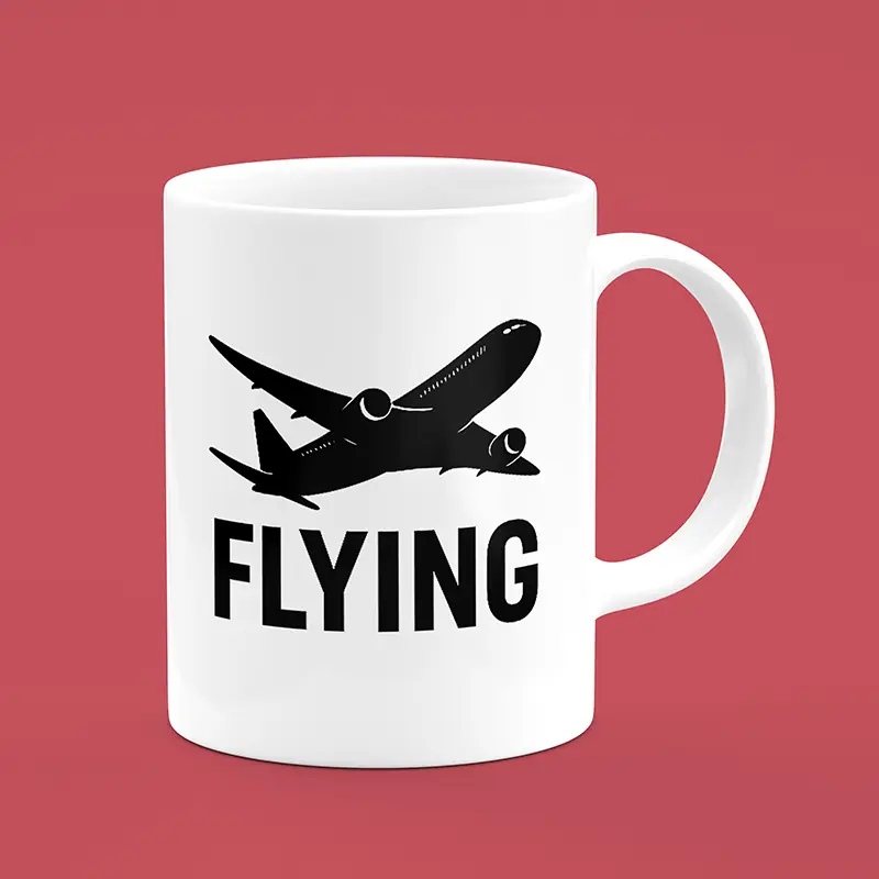 ماگ سفید با طرح هواپیما و نوشته FLYING